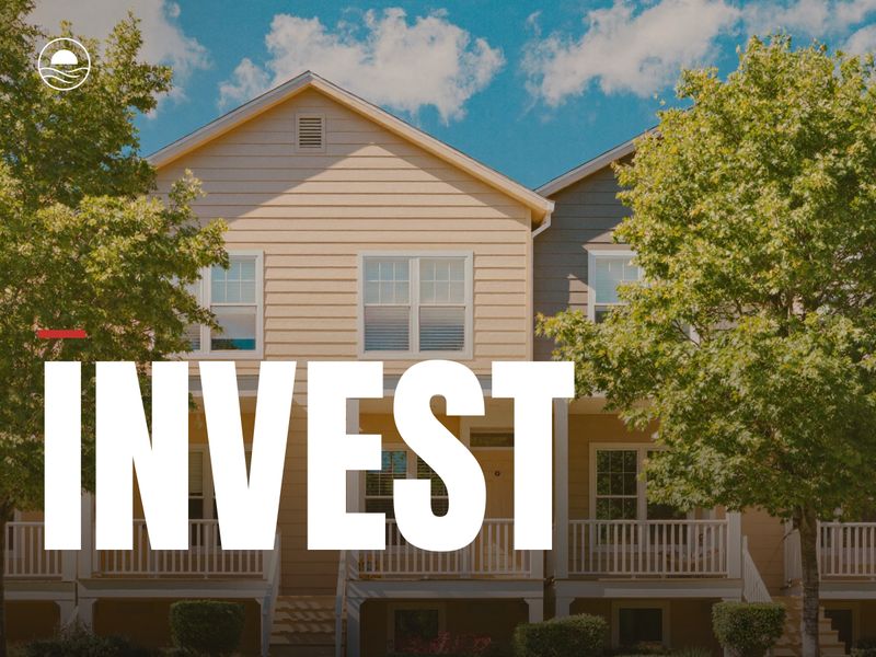 INVEST: a row of sunny two-story rental homes with porches