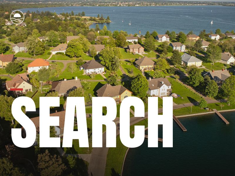 SEARCH: looking down over a sunny lakeshore neighborhood